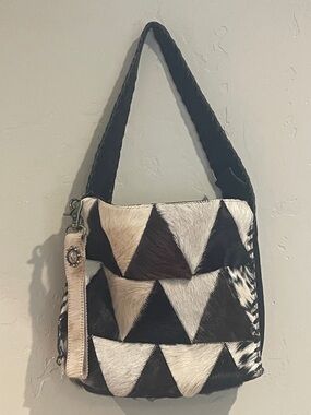 Handcrafted Black & White Cowhide Triangle Patch Shoulder Bag.